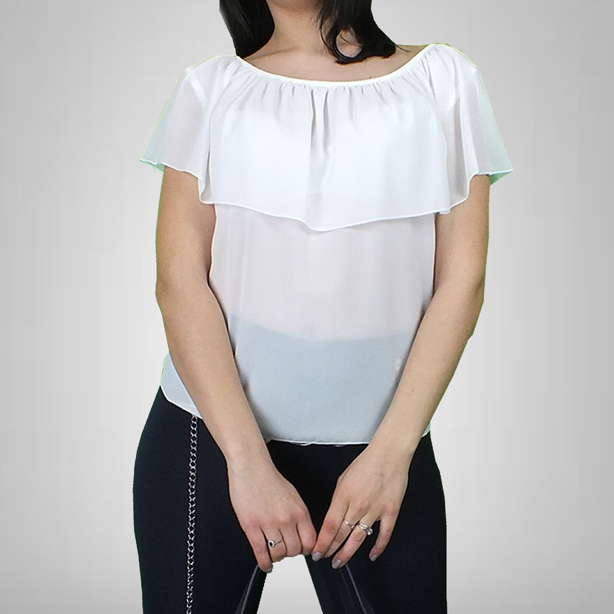 Blusa con volants Akè